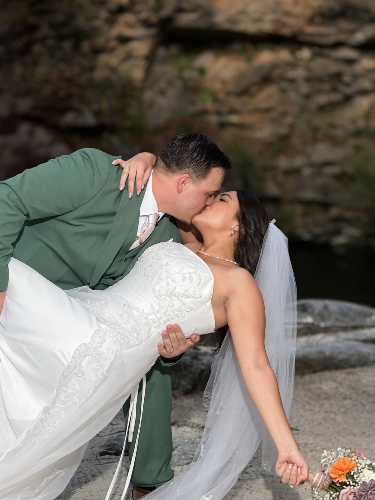 Robert dipping Ashleigh for a kiss beside the quarry